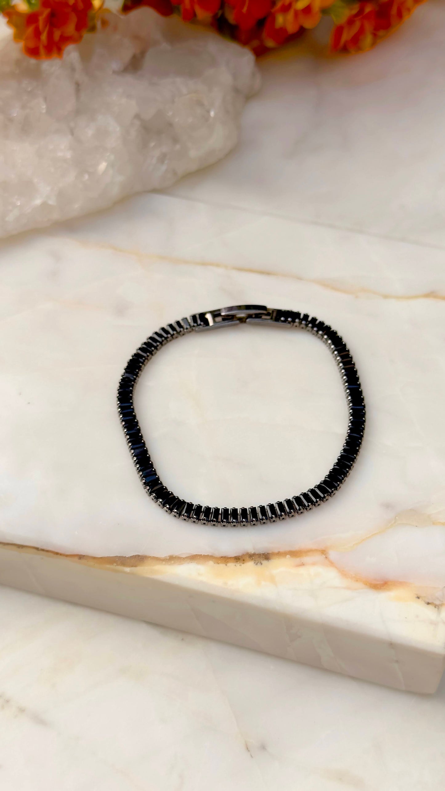 Malleable baguette tennis bracelet in dark rhodium