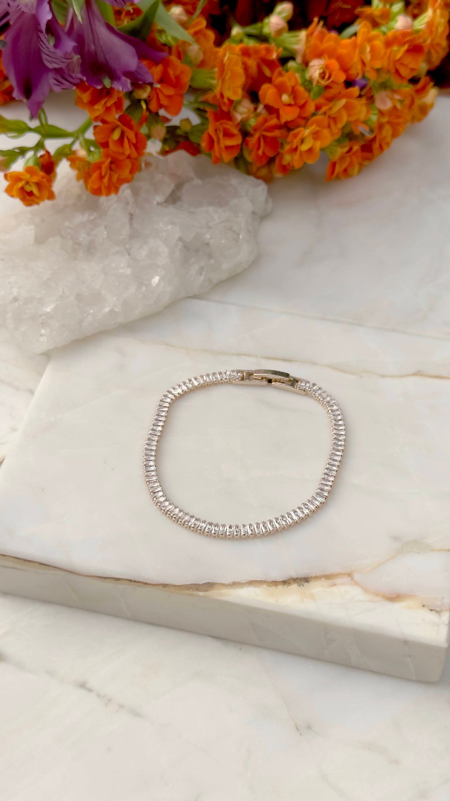 Malleable baguette tennis bracelet in 18k gold
