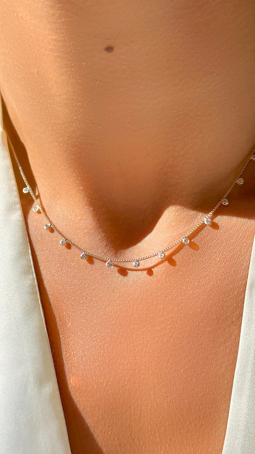 Necklace with several spots of zirconia 18k gold plated
