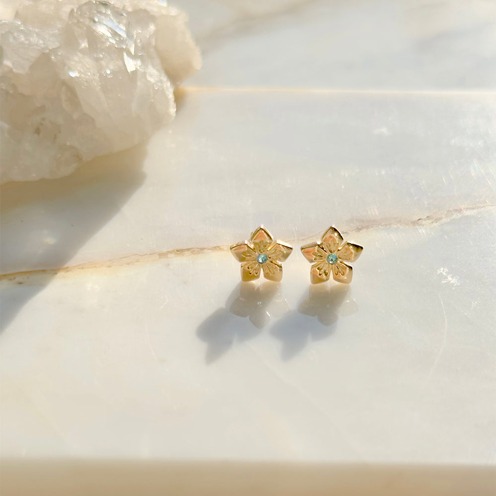 Small Flower Earrings with blue Zirconia at the Center