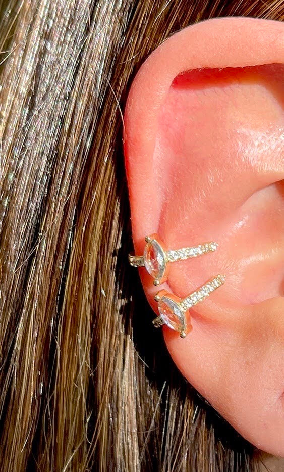 Piercing with blue topaz and white CZ