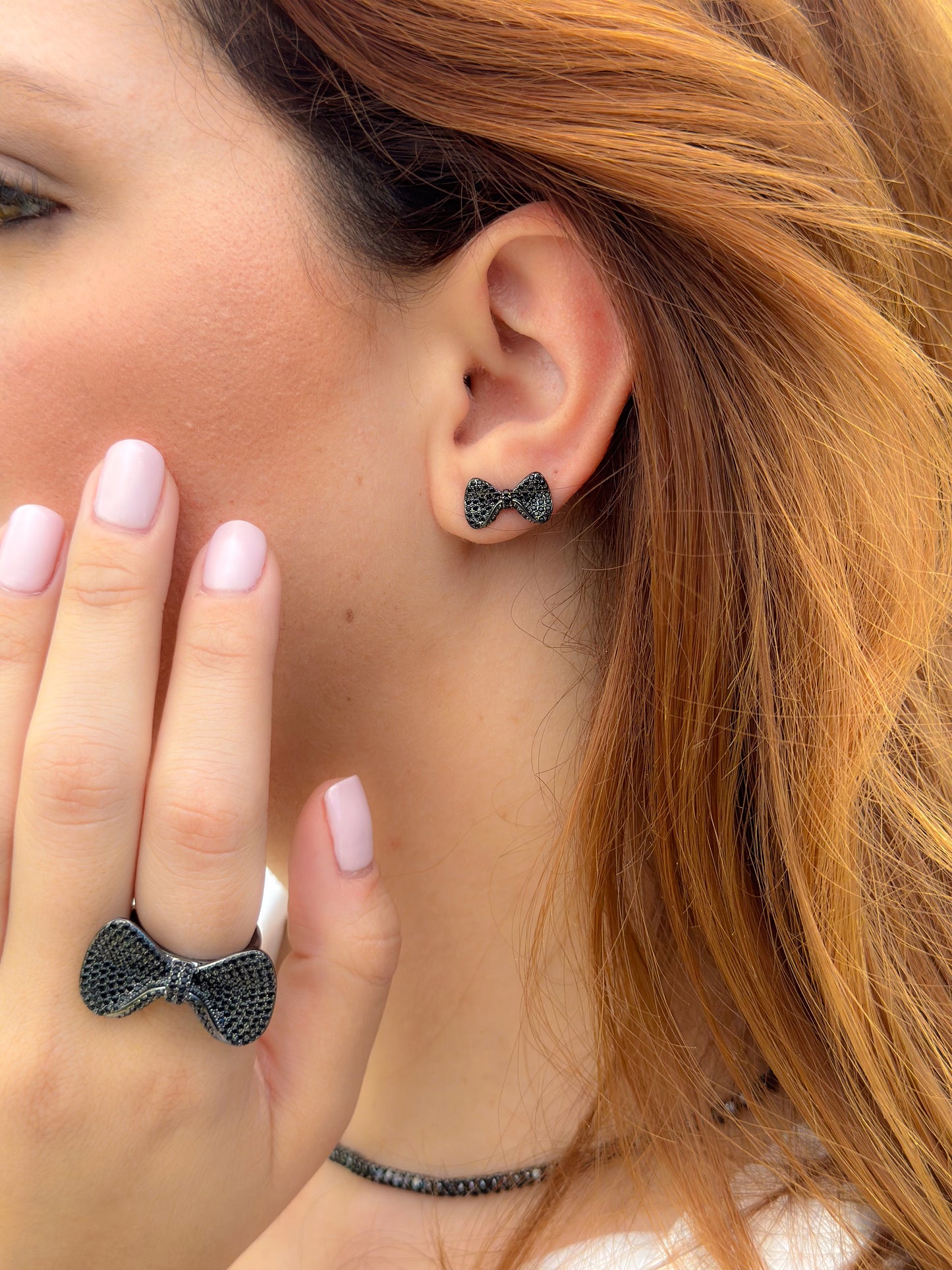 Bow ring in dark rhodium