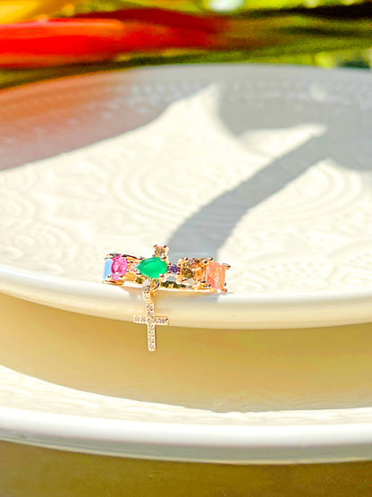 Colored crystals and hanging stud cross ring
